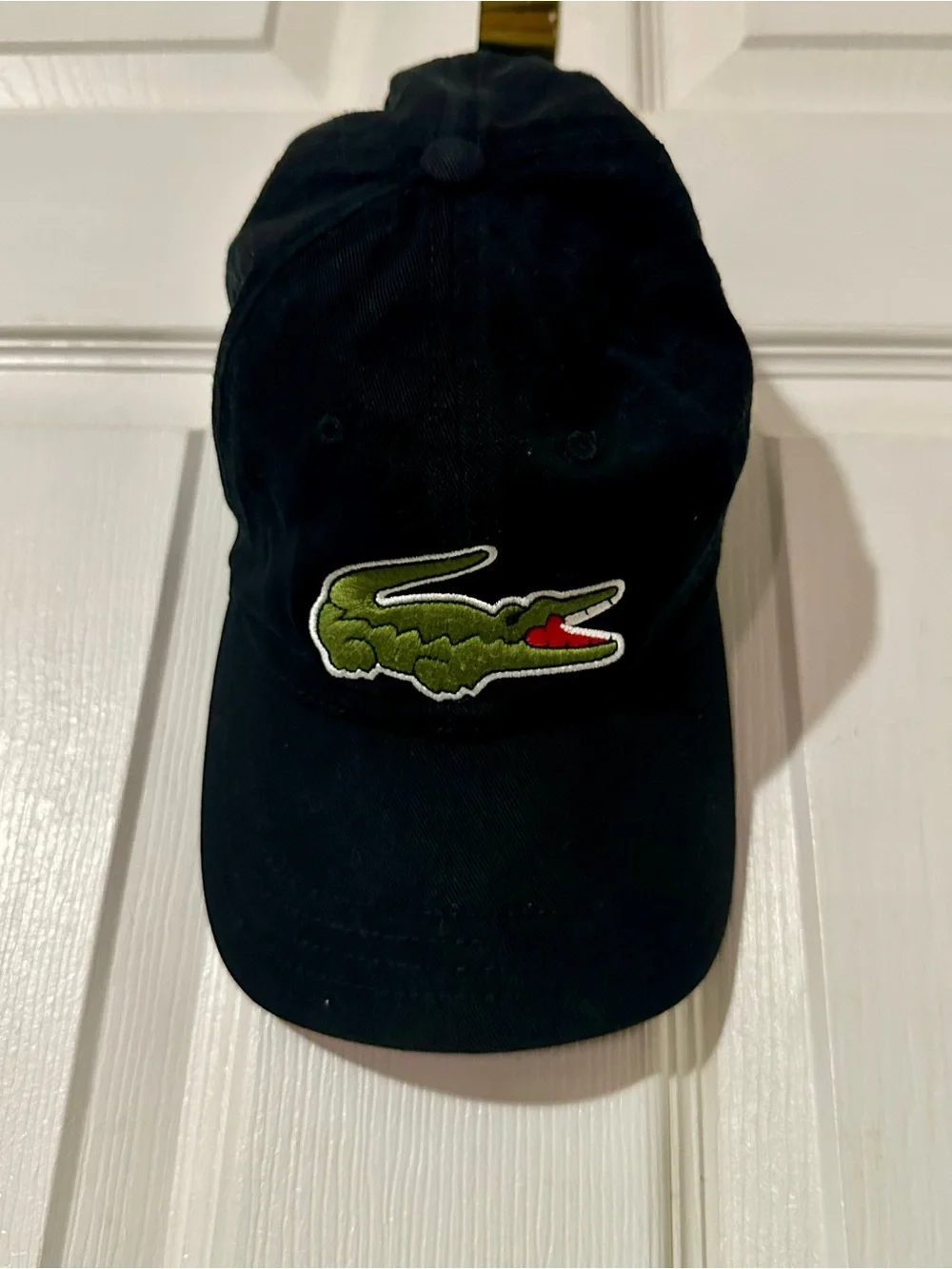 Lacoste Black Cap with Green Branded Interior Taping